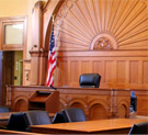 a picture of a court room with an american flag